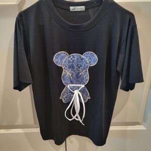 Black T-Shirt with Monogram Pattern Blue Bear Graphic